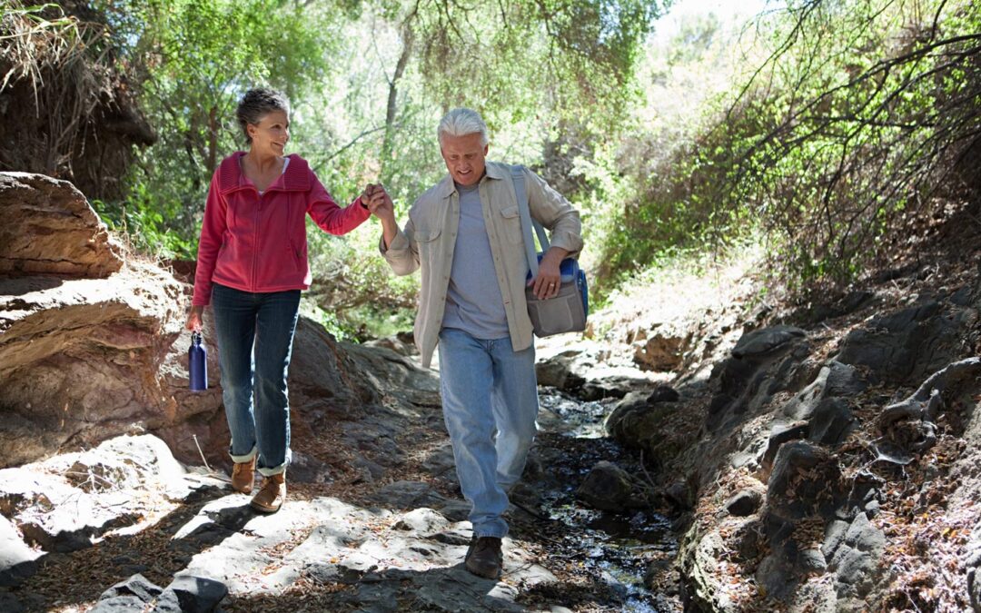 Podiatrist treating foot pain of active residents of British Columbia hiking